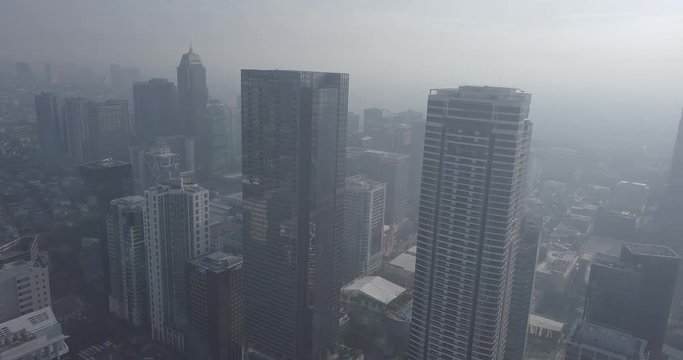 Ungraded, Panel aerial flight through business district's skyscrapers. Drone, 4K.