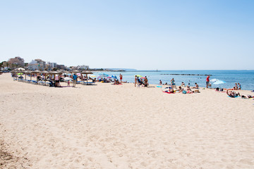 Fototapeta na wymiar Beach with people and sea landscape in Ciudad Jardin, Majorca