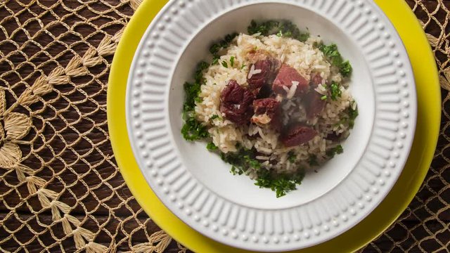 Dried meat with rice with smoke. Traditional bahia food. Top view.