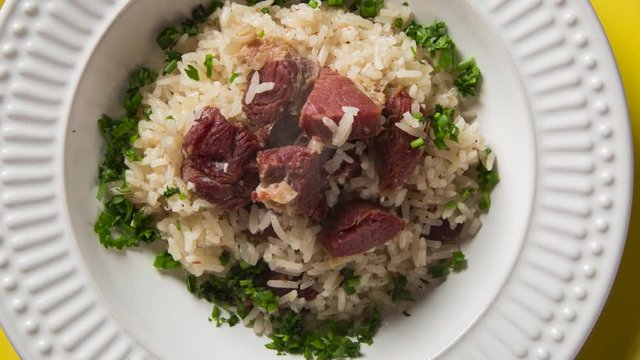 Dried meat with rice with smoke. Traditional bahia food. Top view.