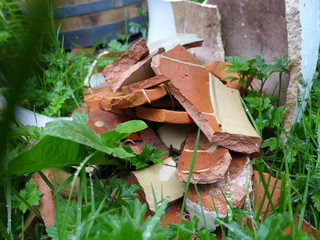 pile of broken clay flower pots