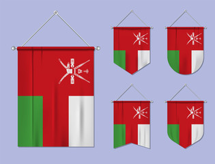 Set of hanging flags Oman with textile texture. Diversity shapes of the national flag country. Vertical template pennant for banner, web, logo, award and festival