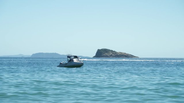 Jet ski and fishing boat. Holiday island