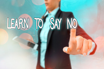 Writing note showing Learn To Say No. Business concept for decline or refuse few things before you...