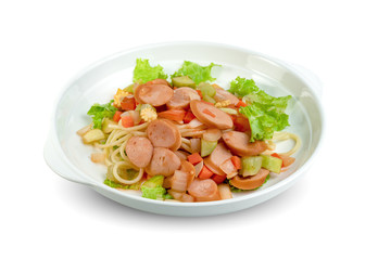 spaghetti noodles with sausage and tomatoes sauce in plate isolated on white background ,include clipping path