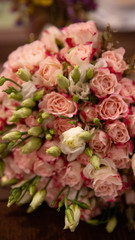 Bouquet of flowers on a wedding day with rings.