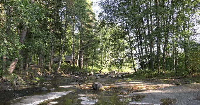 4K Kotka Langinkoski Imperial Fishing Lodge summer day high quality video, green woods, river and bridges in Finland, northern Europe