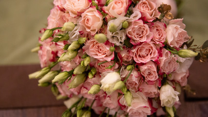 Bouquet of flowers on a wedding with rings.