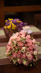 Bouquet of red and white artificial roses.