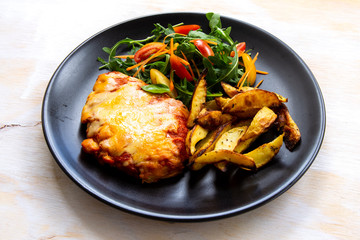 Chicken Parmesan Baked in Tomato Sauce with cheese, chips