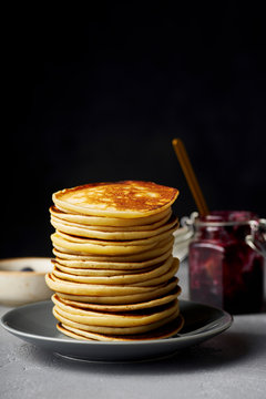 Close up of stack of pancakes on plate