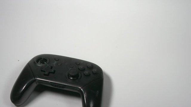 Video Game Controller smashed by hammer.