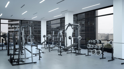Fototapeta na wymiar Empty modern gym interior with sports equipment, heavy gym equipment arranged inside modern fitness club.