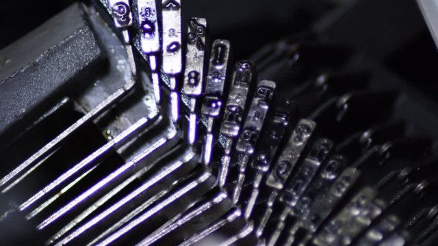 Typo keys in action in a old manual qwerty typewriter