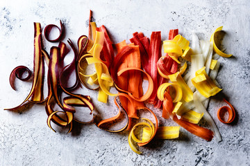 Overhead view of carrot ribbons on table
