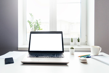 A table with laptop.