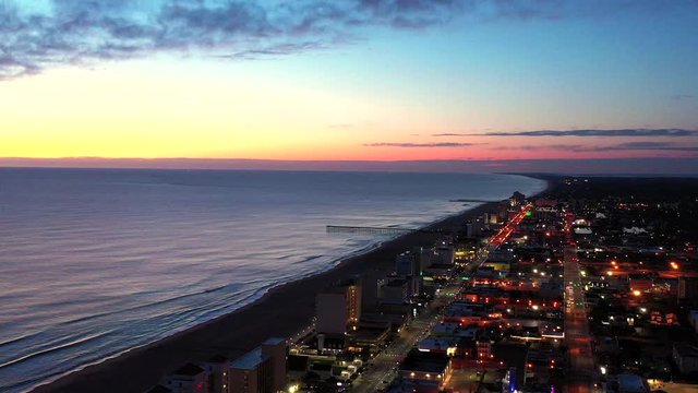Colorful sunrise over beach aerial