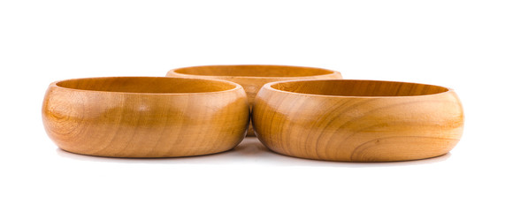 Three wooden bowl isolated on white