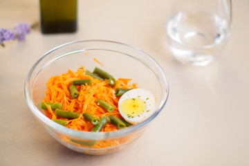 carrot salad and beans on a bould