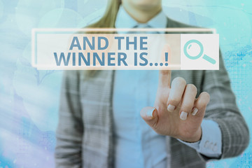 Text sign showing And The Winner Is. Business photo showcasing announcing who got first place at competition or exam