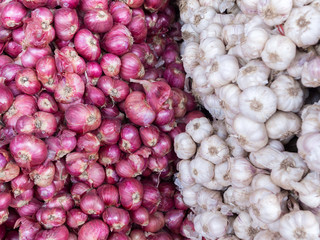 Onions and garlic in the market.