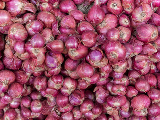 Onions and garlic in the market.