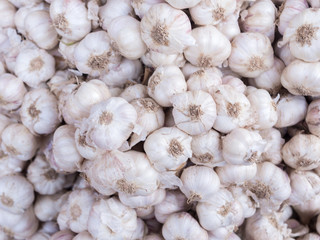 Onions and garlic in the market.