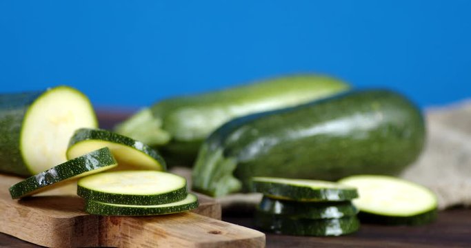 Sliced zucchini on a cutting Board rotates slowly.