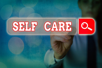Writing note showing Self Care. Business concept for the practice of taking action to improve one s...