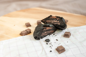 soft dark chocolate brownie cookies on on cutting board