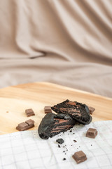 soft dark chocolate brownie cookies on on cutting board