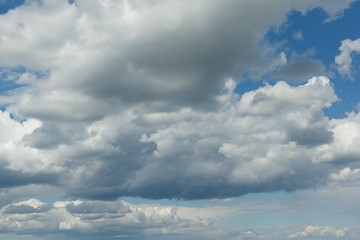 blue sky background with white clouds.