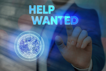 Conceptual hand writing showing Help Wanted. Concept meaning An ad in the paper an employer places...