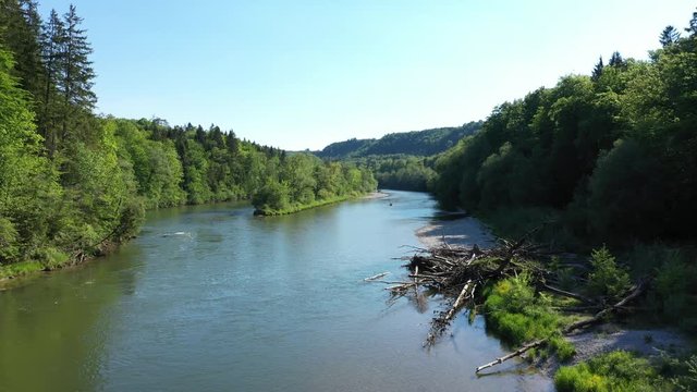 Aerial bird view of Isar River south of Munich. German river near the Alps seen from above.