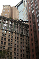 Fototapeta na wymiar Modern and classic high-rise buildings in the center of Manhattan. Brick architecture of Manhattan in the center of new York.