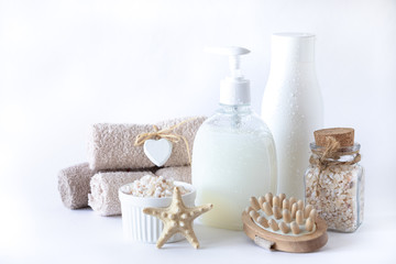 Obraz na płótnie Canvas Organic spa cosmetics for face and body on a white background. Eco bathroom accessories. Copy space