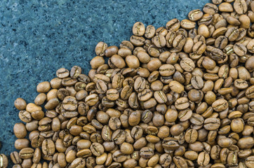 Texture, background of whole coffee beans, raw.