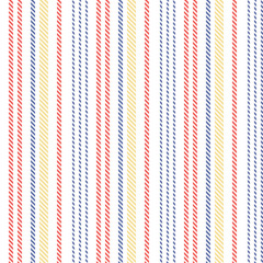 Stripe pattern. Seamless abstract vertical multicolored stripes in blue, red, yellow, white for spring and summer fashion or home textile design.