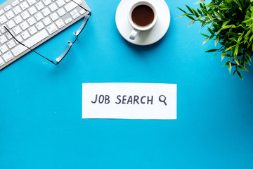 Job search. Blue office desk form above. Hiring concept