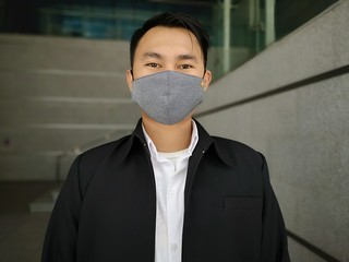 Men wear cloth masks to protect the corona virus.