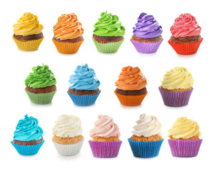 Many colorful cupcakes on white background