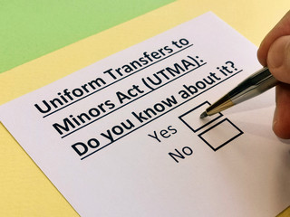 Obraz premium A person is answering question about uniform transfers to minors act (UTMA).