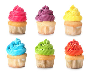 Colorful cupcakes on white background