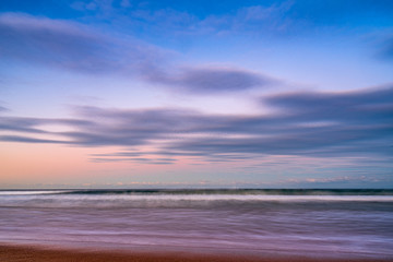 Fototapeta na wymiar sunset over beach 