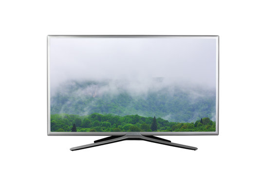 4K monitor or TV with a spring or summer cloudy foggy landscape on the screen isolated on white background
