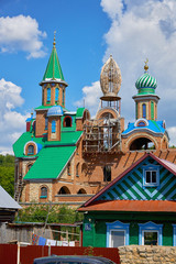 Fototapeta na wymiar Russia, Kazan June 2019. Colorful Temple Of all Religions in Kazan on a summer day. beautiful universal temple of many religions.