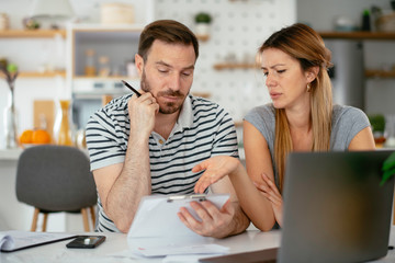 Tired businessman working at home. Young man having a problem.