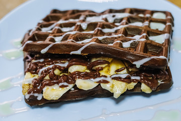 tasty Belgium waffle with organic sweets served for breakfast