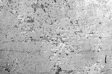 Texture of a concrete wall with cracks and scratches which can be used as a background