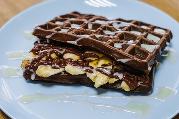 tasty Belgium waffle with organic sweets served for breakfast